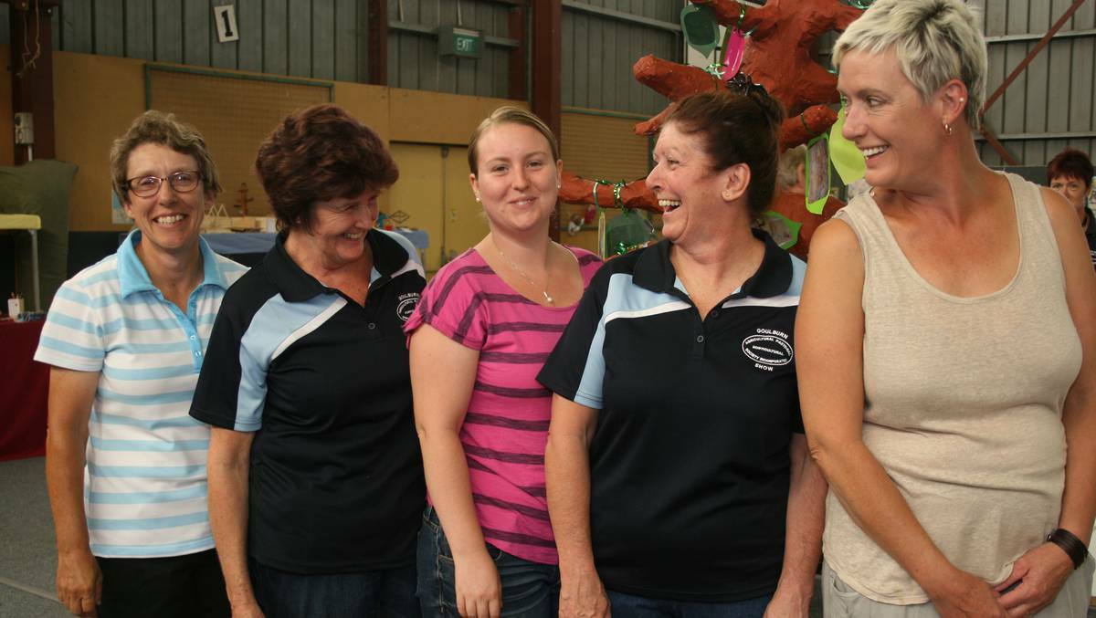 Some of the hard-working volunteers preparing for the Goulburn Show. | Photo BRITTANY MURPHY.