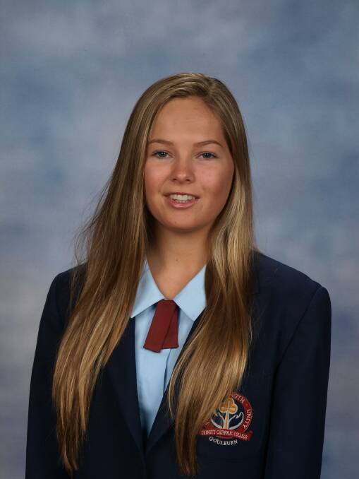 WELL DONE: Trinity Catholic College student Emerson Kidd is the school’s dux for 2014. Her fellow students Olivia Stutchbury (with an ATAR of 91.3) and Cassandra Russell (90.65) also did extremely well. 