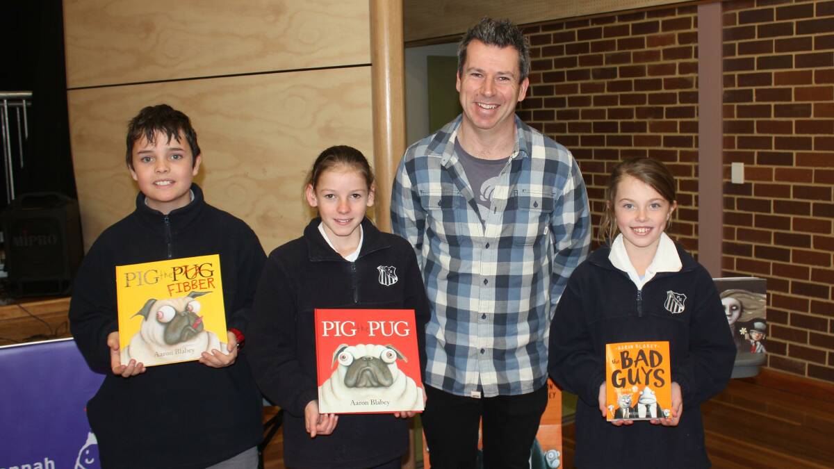BOOKMAN: Children’s author and illustrator Aaron Blabey gave a talk at Goulburn West Public School on Monday. Pictured are students Bryden Mullan, Paige Dunbar, Mr Blabey and Matilda Stewart. 