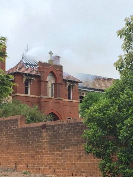 Posted on Twitter by @GoulburnPost: "@FRNSW battling this blaze at St John's boys' home #goulburn." 