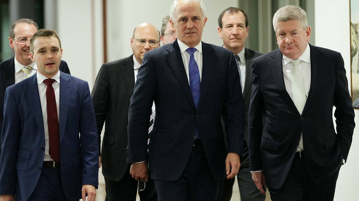 Prime minister elect Malcom Turnbull surrounded by some of his supporters before the leadership ballot at Parliament House on Monday. Photo: Andrew Meares