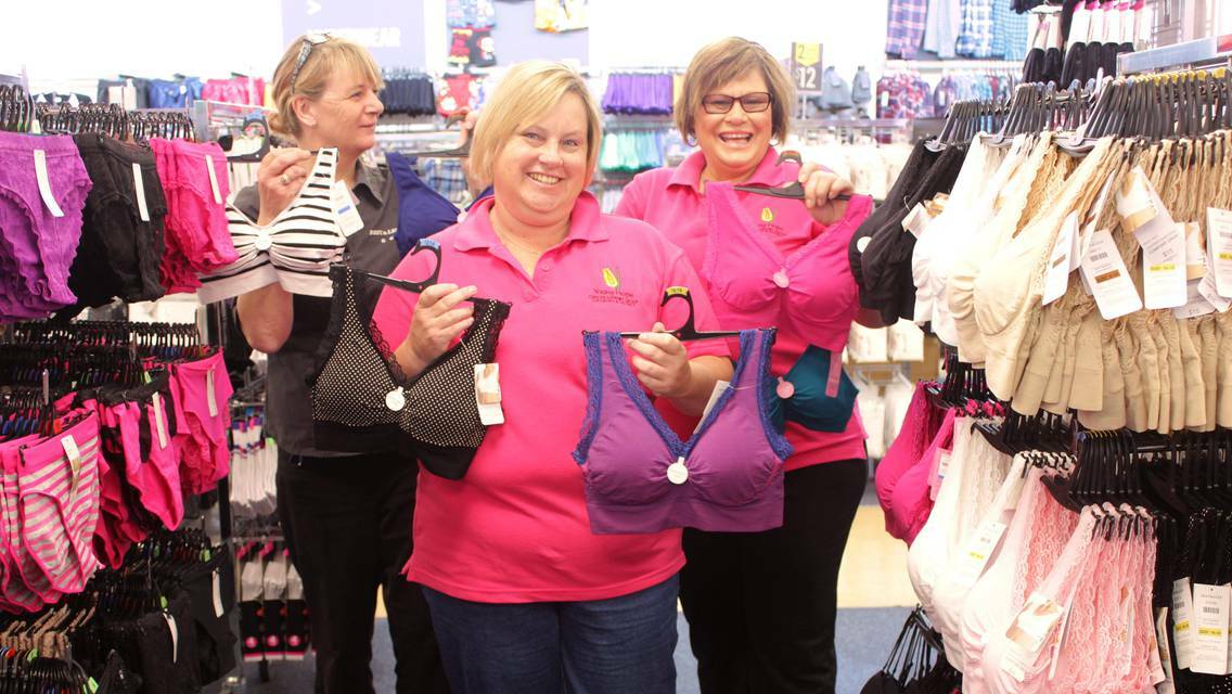 GOULBURN: Young Hope’s Kathy Staines (centre) and Mel Byrne (right) with Best & Less Goulburn store manager Raylene Lockett, displaying special bras suitable for mastectomy survivors.