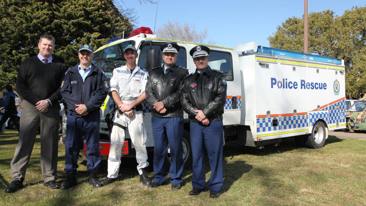 THIN BLUE LINE: Det Sgt Matt Woods, Sgt Peter Vaughn, Sen Con Scott Nichols, Superintendent Zoran Dzevlan and Det Insp Chad Gilles in Belmore Park yesterday, as part of the Hume Local Area Command’s community engagement day.  