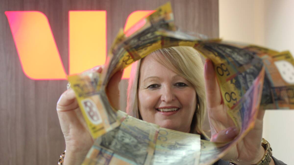 GIVE AWAY: Be quick to tell Westpac Goulburn branch manager Sonya Rups, pictured, how your charity would splash $500 cash. Photo: Ainsleigh Sheridan