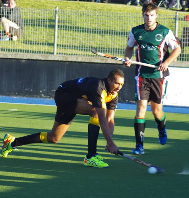 STRONG DEFENCE: Old Canberrans’ Seyi Onitiri defending his teams goal area during their previous encounter with Goulburn on May 16. In the background Goulburn’s Aaron Kershaw who had just lost possession of the ball. (Photo by Darryl Fernance).
