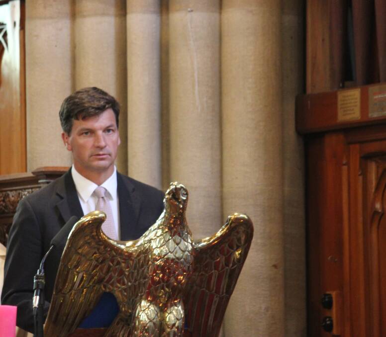 READING: Federal Member for Hume Angus Taylor read a passage from Matthew chapter 5 verses 1-9 at the service. 