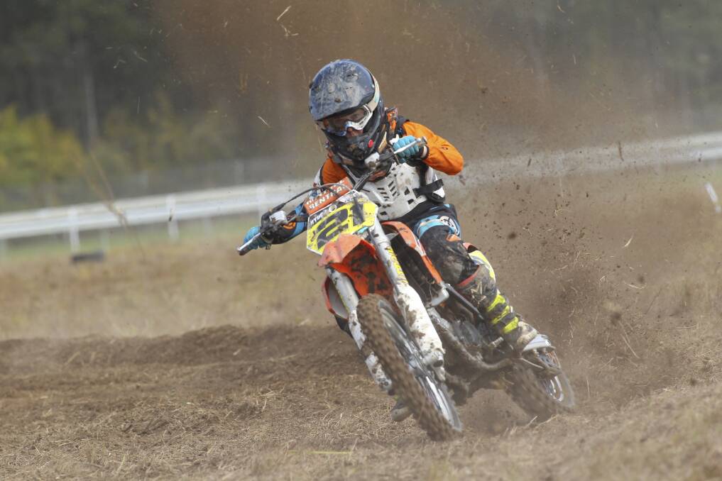 POWERING AWAY: Goulburn Motor Cycle Club junior and NSW MX team member Ryder Kingsford, 10, competing in the Dirt Action Amcross Series event at Nowra. Goulburn Motor Cycle Club is hoping that plenty of people will support the pizza and pasta fundraiser for the boys, tomorrow night at the Greengrocer on Clifford. Photo supplied.