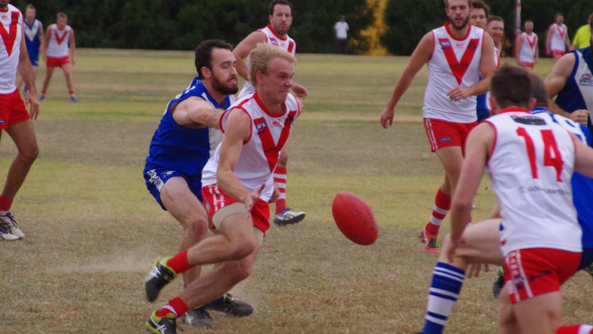 CONTEST: Simon Treloar contests the ball during a game against ANU on Goodhew Park earlier this season. Photo Darryl Fernance .