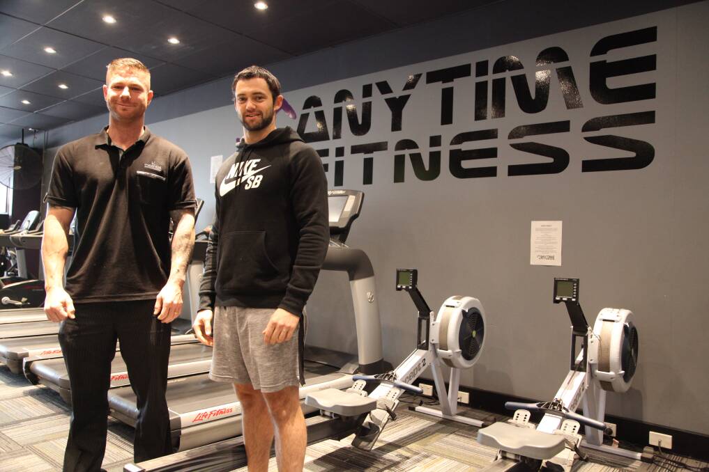 FUNDRAISER: David Campbell, who will push Justin Gundry in this year’s City2Surf and Chris Cockburn from Anytime Fitness, where a fundraising fitness competition will be run this Saturday.