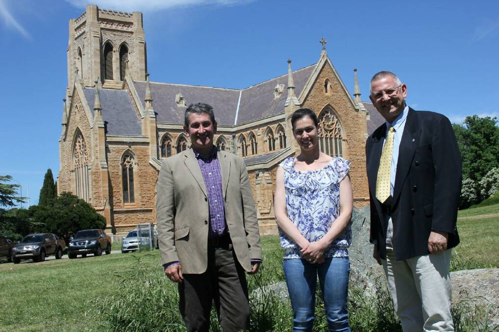 GUEST: Goulburn’s Australia Day Ambassador for 2015 Warren Brown, Goulburn Mulwaree Executive  Support Officer and co-ordinator of the 2015 Australia Day celebrations Kristy-Jo Cooper and Goulburn Mulwaree Mayor Geoff Kettle on the St Saviour’s Common recently. 
