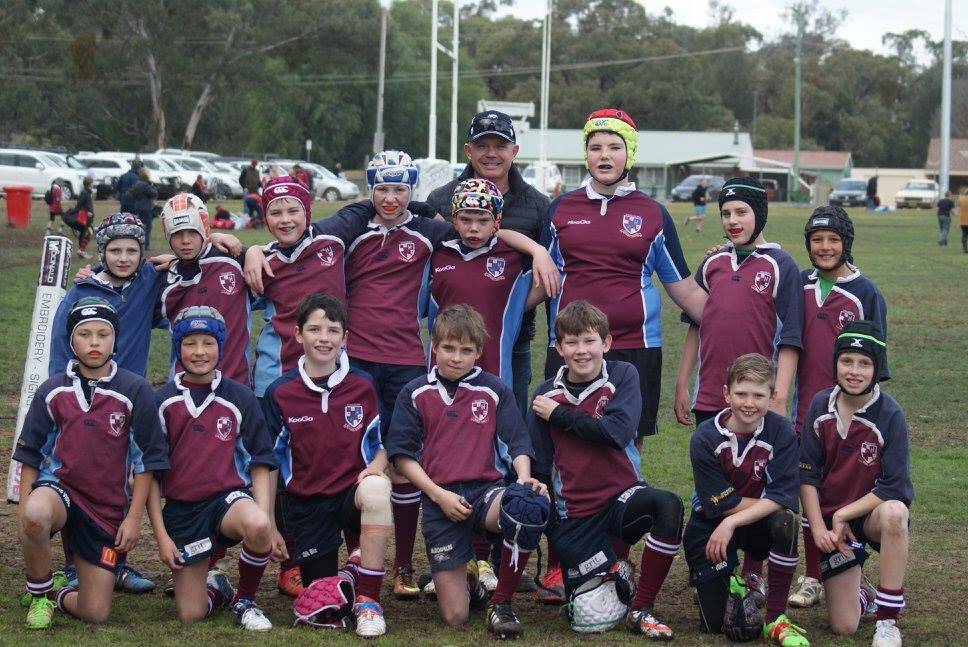 KEEN TO LEARN: Under 12 Goulburn Junior Rugby Development Team with coach Tim Gibson (behind) Back: Darcy Hallam, Nicolaas Brits, Max Whittaker, Alec Elliott, Finn Gibson, Jamie Robertson, Will Barker and De Wet Brits. Front: Alan Niwa, Tom Skeffington, Charlie Moroney, Ben Hallam, Isaac Stanberg, Bailey Shipp and Isaac White. 