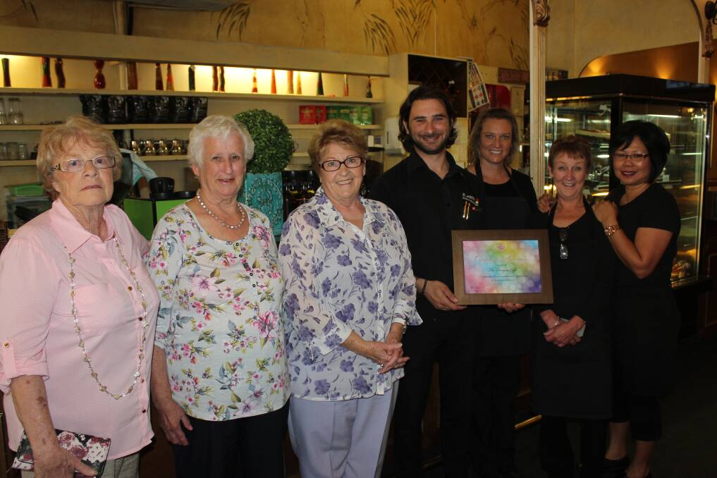 SUPPORT: Goulburn Teapot Club members Del Shephard, Mel Ashton (president) and Pat Bryant with Paragon Cafe staff Lazaros Foinikopoulos, Jodie Cooke, Kerrie Tamsett and Delia Lang.