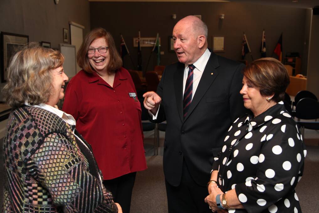 HELLO, YOUR EXCELLENCY: Brenda Phillips and Margaret Clinton from the CWA share a laugh with Sir Peter and Lady Lynne at a civic reception yesterday.