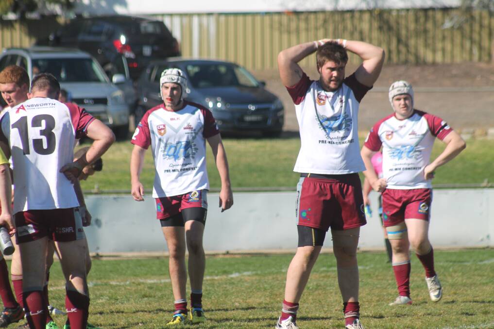 A disappointed Queanbeyan Kangaroos reserves outfit after they were denied a chance to defend their title. Photo: Joshua Matic