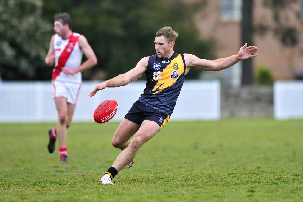Queanbeyan Tiger Nathan Kerlin takes a kick during his side's big win over Eastlake last Saturday. Photo: Jeffrey Chan.