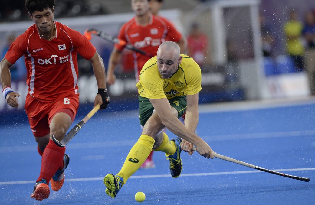 FOCUSED: Glenn Turner shoots for goal during the game against Korea on June 11, in the Champions Trophy competition in England. Photo: Ady Kerry for Hockey Australia.
