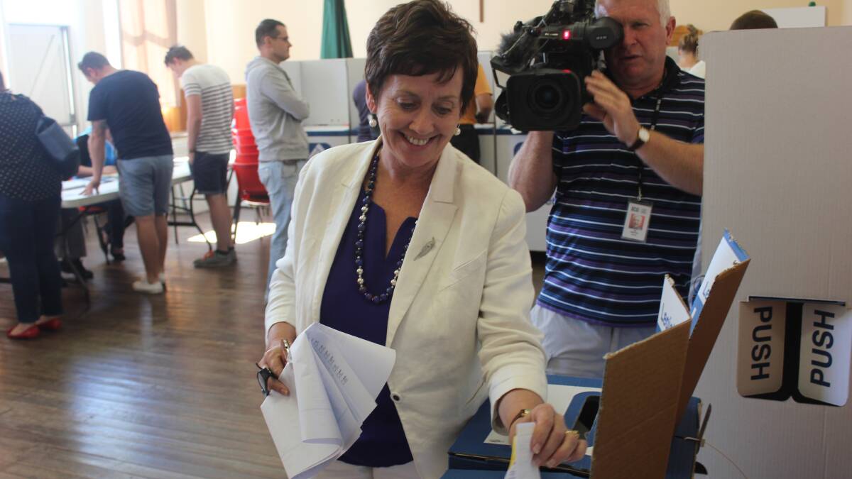 EVERY VOTE COUNTS: Ursula Stephens voting on Saturday at the Uniting Church in Goulburn.
