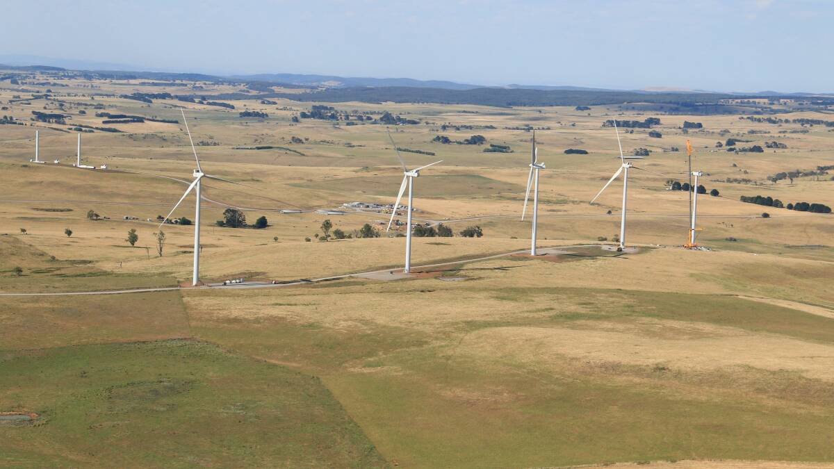 

 BIG PICTURE: Testing at the Taralga Wind Farm, under construction, is affecting television reception in the village and surrounds. Photo by Col Douch for Taralga Wind Farm Pty Ltd.
