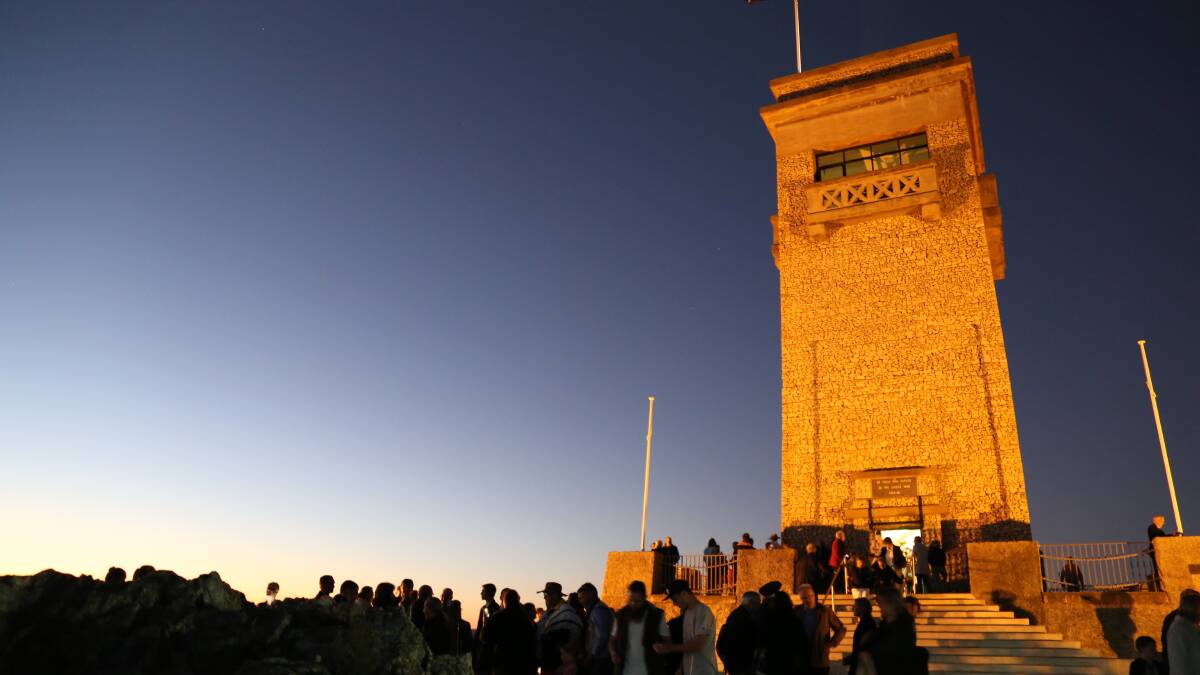 AT THE GOING DOWN OF THE SUN . . . A new evening service at Rocky Hill War Memorial was popular with crowds and will likely return in 2017. Photo: Brittany Murphy