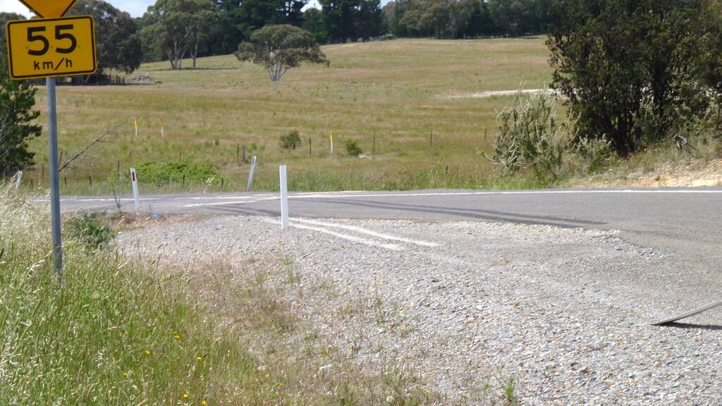 DANGEROUS: Locals say the section of Sandy Point Rd at Windellama where the bus carrying Australian Defence Force Academy cadets rolled on Saturday needs to be realigned. Photo: Allan Chapman.