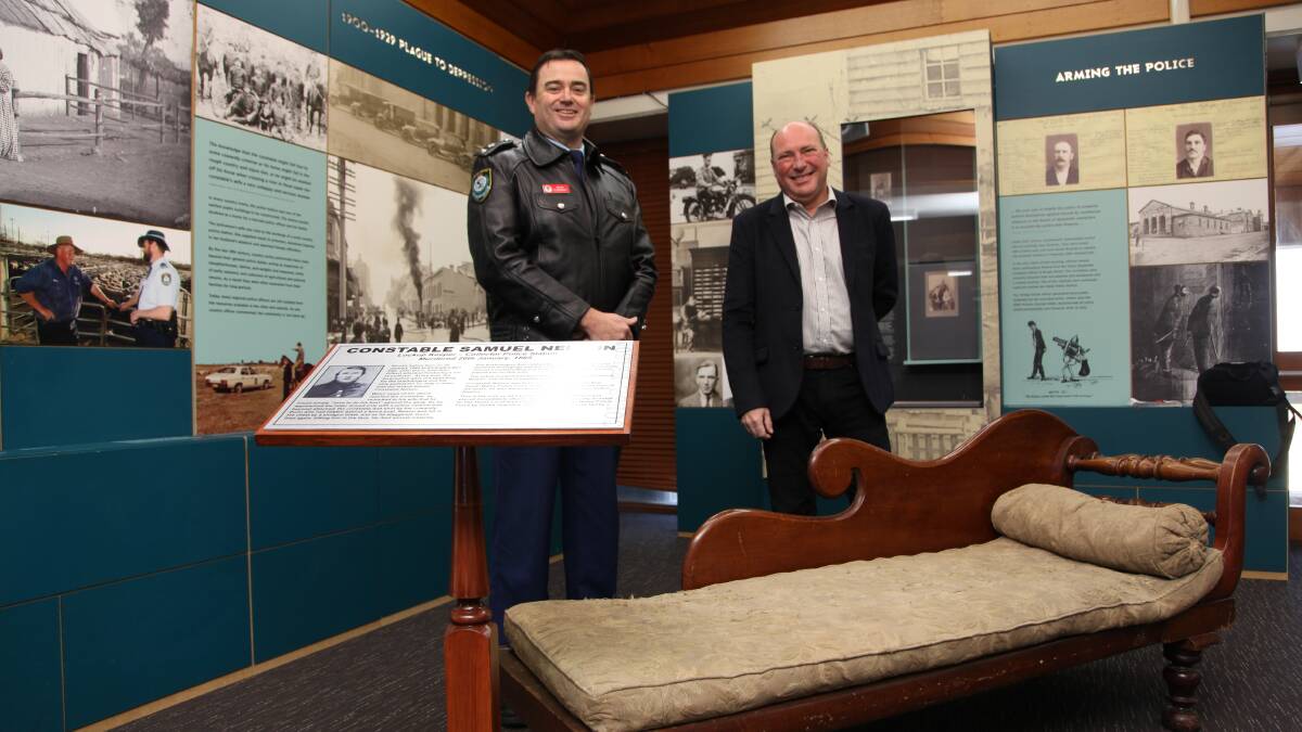  HISTORY: Acting Hume LAC Commander Evan Quarmby and Peter Zantis with the Nelson Lounge. It will now call the NSW Police Academy home, after Mr Zantis and his wife Belinda donated the historical item to the Academy’s collection.
