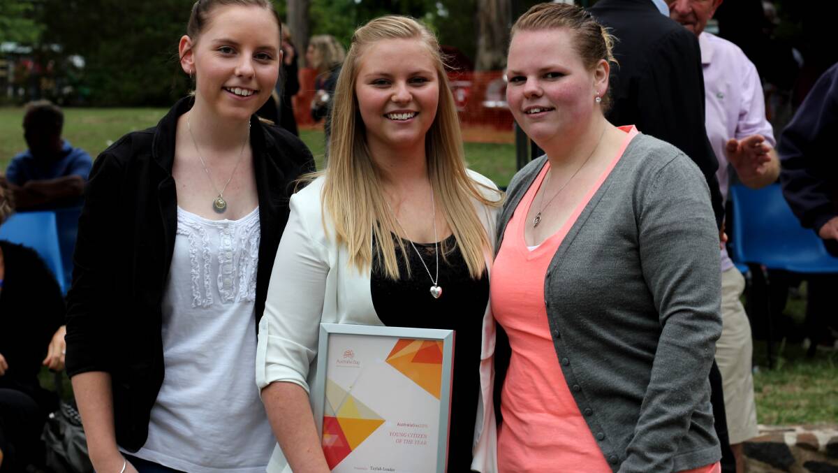 Taylah Loader (centre) is our young citizen of the year for 2015. Her sisters Maddie (left) and Kate couldn't be more proud.