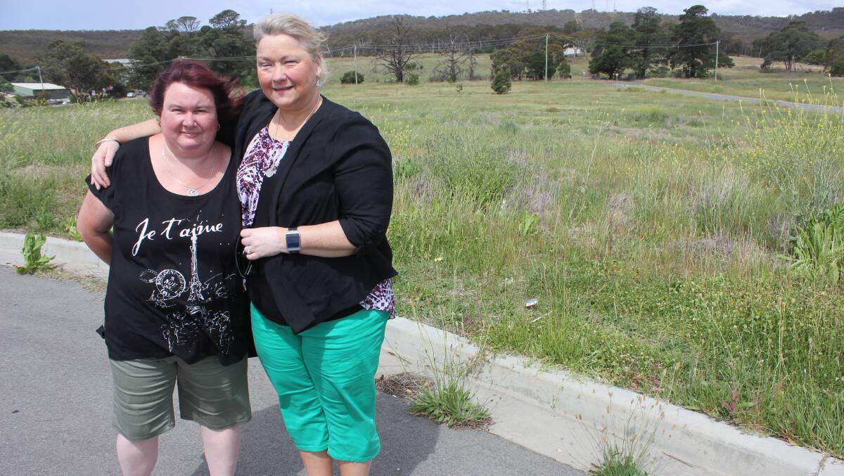 Melissa Rodger and Karen Mills were out on an afternoon walk on Common St North Goulburn when they saw the legendary Goulburn Panther. They are pictured near the spot where the creature lay.