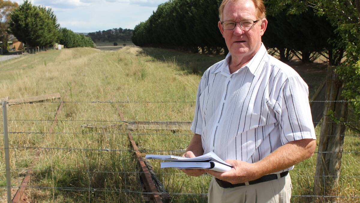 Bob Kirk looks over the feasibility study, a collective investment of more than $30,000 from Goulburn Mulwaree Council, Upper Lachlan Shire Council and stakeholders.