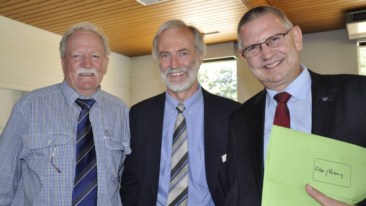 TALKING TERMS: Mayor Geoff Kettle (right), Palerang Mayor Pete Harrison (centre) and Goulburn Mulwaree councillor Denzil Sturgiss swapped notes at Tuesday’s public inquiry into the merger proposal.