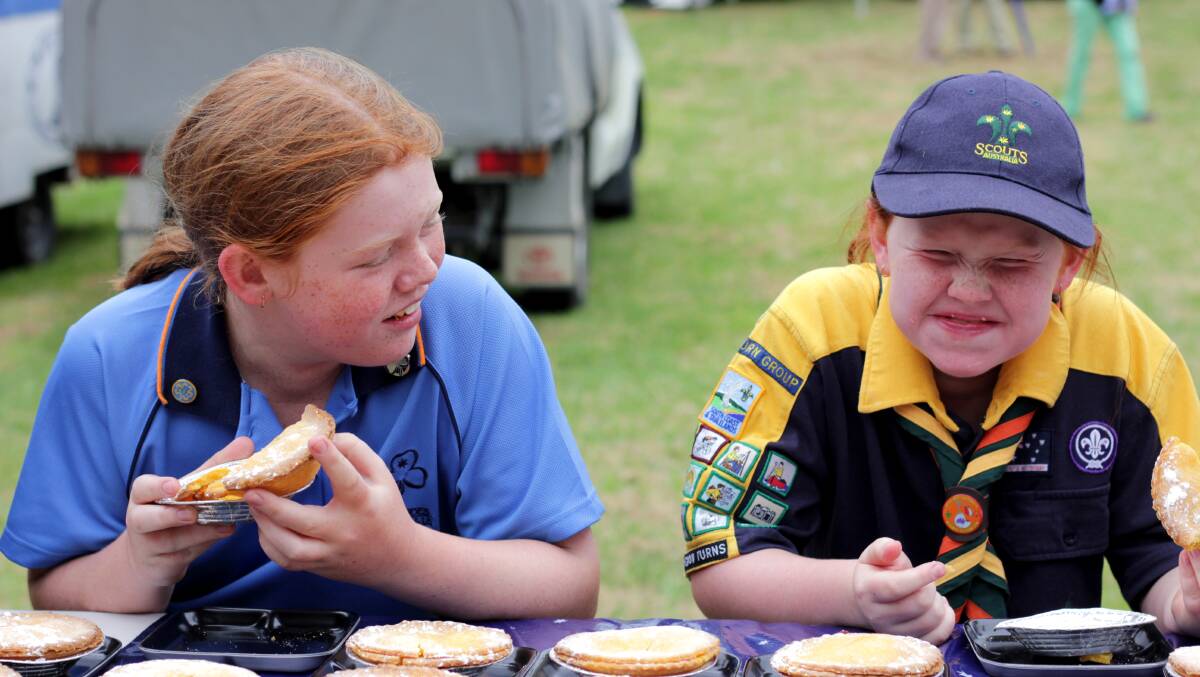 Gemma and Alyssa Hollands in the pie eating competition at Monday's Australia Day celebratons. Photo: Brittany Murphy