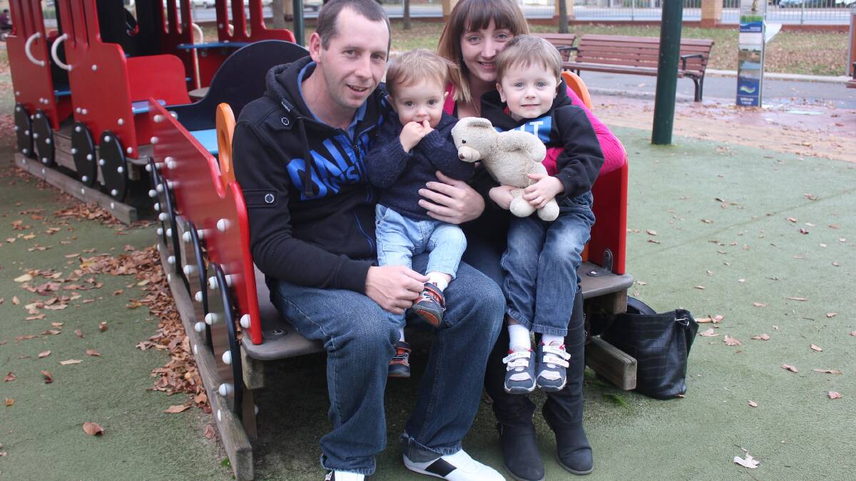 DISAPPOINTED: Ty, Franklin, Alana and Hugh Chinnery in Belmore Park recently. The family is disappointed with the government’s recent cuts to
funding to assist with their son Hugh’s rare genetic condition.
