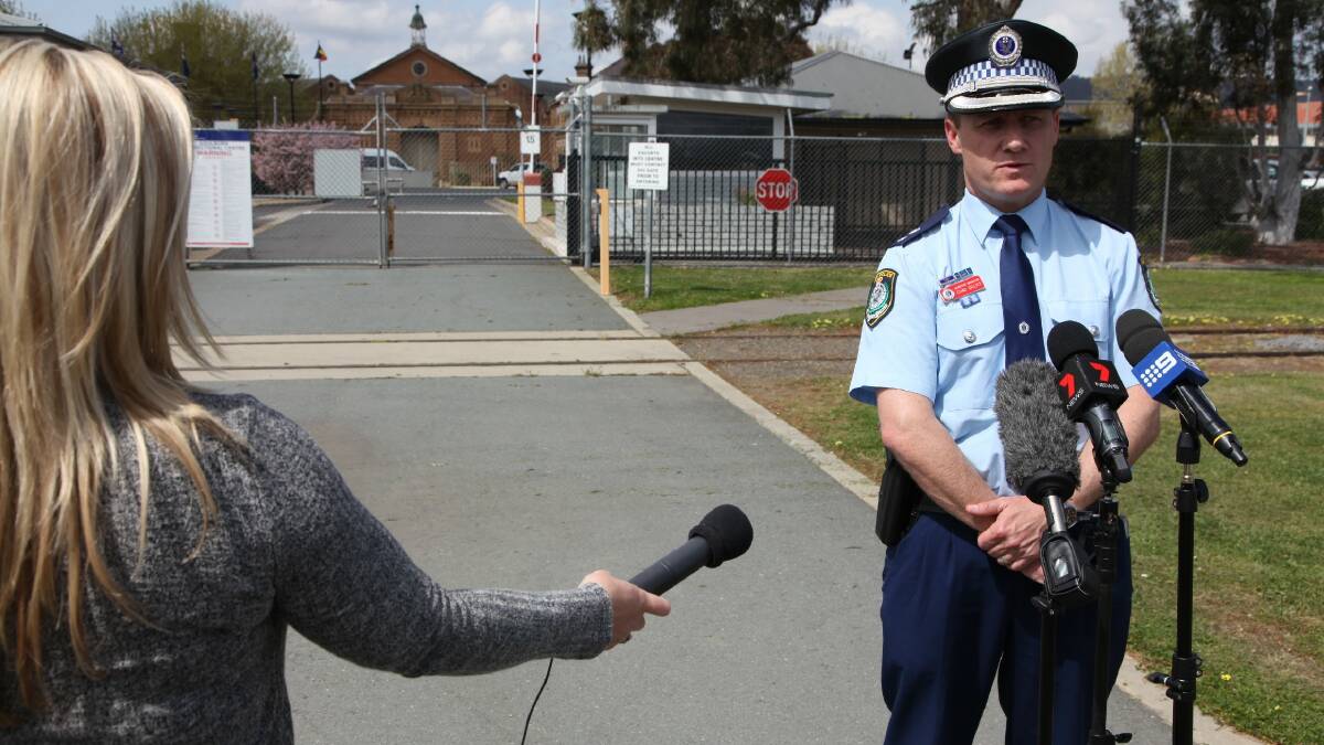 ON THE SPOT: Acting Hume Local Area Command Superintendent Chad Gillies faces the media on Wednesday outside Goulburn Jail after inmate Beau Wiles escaped.