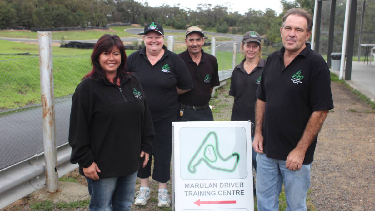 APPROVED: Marulan Driver Training Centre staff Garry and Natalie Wilmington (front) with administration manager Judy Ellacott, track marshal and trainer Jeff Costello, and cafe manager Tanya Broadfoot pictured in April last year.