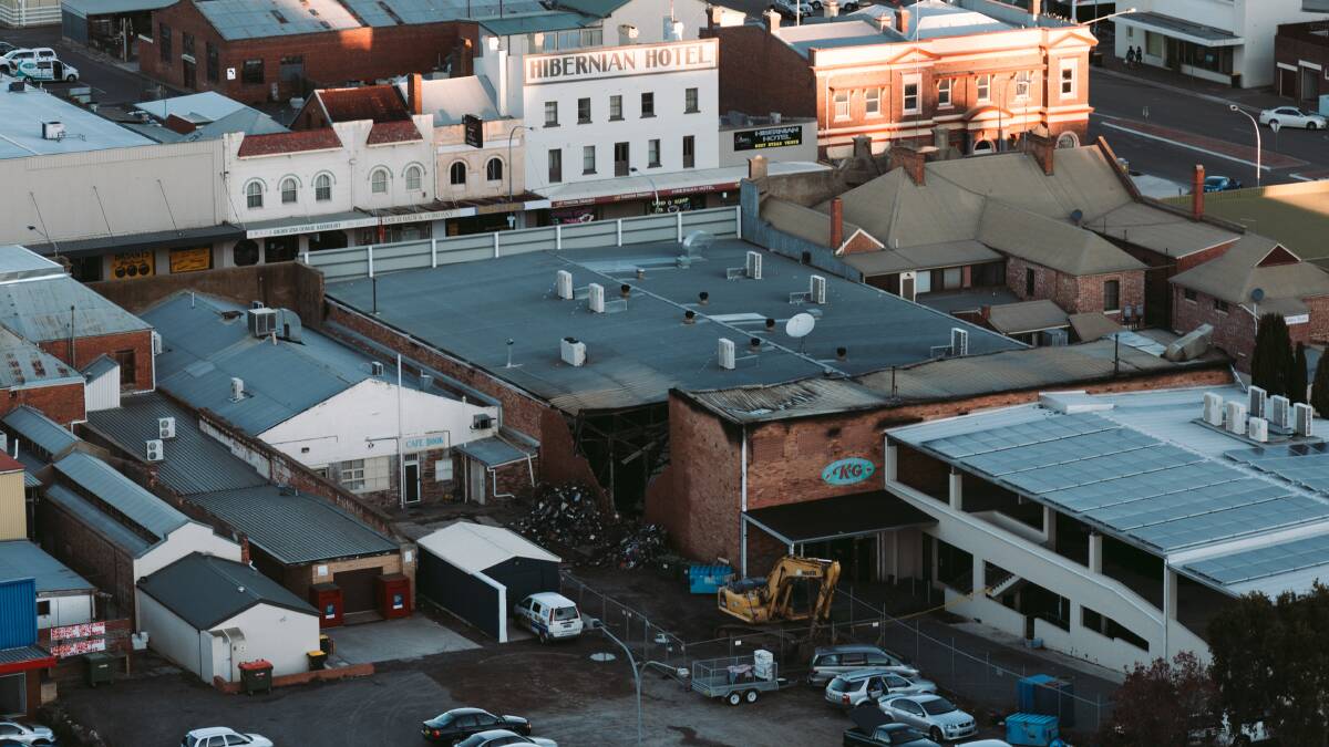 FROM THE TOP: An aerial view of the fire damaged Centrelink. A northern wall of the building was demolished on Tuesday to allow complete extinguishment. Photo: Brittany Murphy.