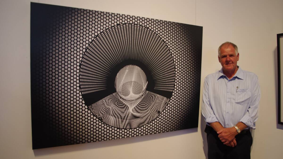 THROUGH THE LENS: The late Joe Medway had a creative mind and a passion for telling stories through his photographs.

Post photographer and friend Darryl Fernance captured him with his creative abstract work entered in last November’s Goulburn and District Art Prize.
