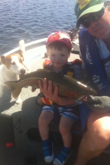 WHAT A CATCH: Two-year-old Oliver and his dad James Picker reeled
in the winning 60cm rainbow trout on Sunday. Photo: Supplied.