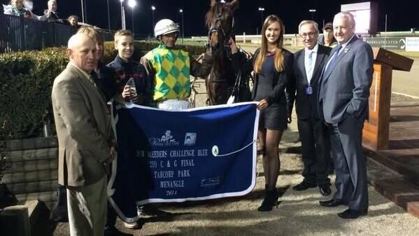 SPARE ME DAYS:
The Brad Hewitt
trained Spare Me
Days won the
Breeders
Challenge Blue
final at Menangle
last Saturday.
Fittingly, in the
biggest win of his
career, it was his
father David
Hewitt who drove
the two-year-old
colt to victory.