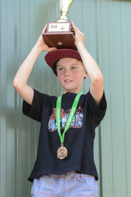 Ryder with his Nationals third place trophy. Photo: Supplied. 