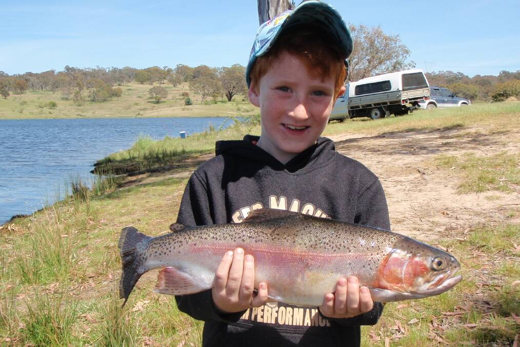 BIG FISH: A junior angler at last years Trout Classic at Pejar Dam. Photo: Supplied