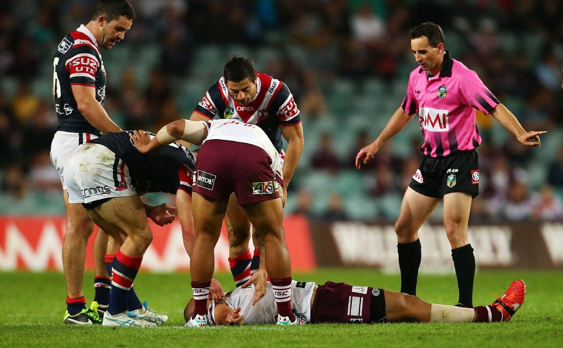  OUT: Richie Fa'aoso of the Eagles is concussed during the NRL Qualifying Final match between the Sydney Roosters and the Manly Warringah Sea Eagles at Allianz Stadium on September 14, 2013 (Photo by Mark Nolan/Getty Images)