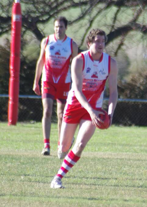 Brad Armstrong in action in a match against ADFA last year. Photo: Darryl Fernance.