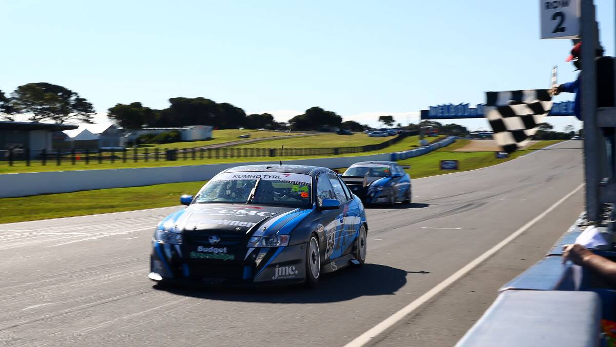 MIGHTY RETURN:
Justin Ruggier is
within three points
of the Kumho
Tyres V8 Touring
Car Series lead.