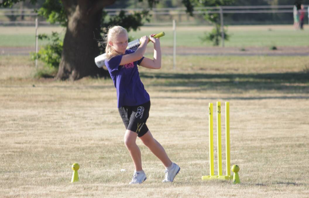 EYES ON: Isabella Greig has a keen eye for the ball. She’ll be a flag
bearer at next Wednesdays ODI between Australia and South Africa at
Canberra’s Manuka Oval.