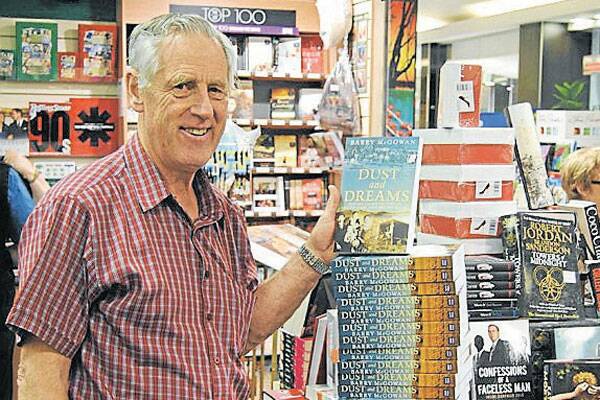 Goulburn Angus and Robertson owner Ken Briggs is pictured next to Barry McGowan’s book which Barry will be signing Centro Goulburn store from 10.30am to 12.30pm on Saturday.