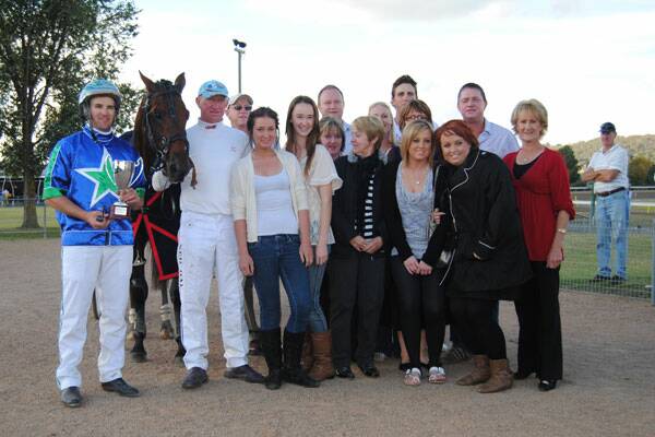 Trainer/driver Luke McCarthy and Washakie received their prize from the Day family, relatives closest to Frank and Edna Day.