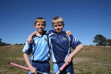 YOUNG GUNS: Wollondilly Public School students Jake and Ben Staines were the only Goulburn kids to represent their State at this year's National Hockey Titles.