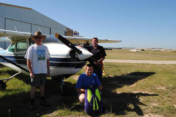 FLYING HIGH: Adrenalin Skydive parachutist Ken Enright, pilot Terry Anderson and Chief Instructor Bill Tuddenham will open a skydiving school at Goulburn airport from 5 March.