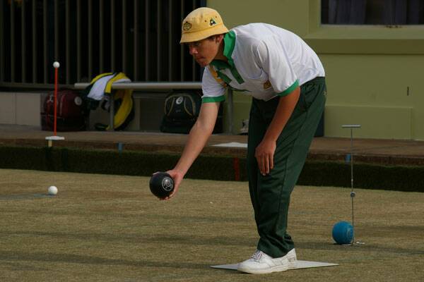 TAKING AIM: Andrew Carlon takes aim at the head during a recent competition at the Goulburn Railway Bowling Club.