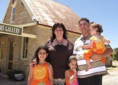 FAMILY VENTURE: South Marulan residents Leanne and Richard Mifsud will start construction on Marulan's first supermarket and six specialty shops if Goulburn Mulwaree Council approves a development application this month. The couple is with their children Calista, Chelsea and Ricky-Lea.