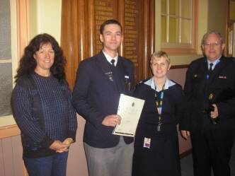 CAP:AWARD: Aidan's mother Lynda Morrison, Aiden Smith, recruitment corporal Rachel Rich, and wing commander Mark Quilligan. The Defence Force personnel made a special visit to Goulburn to award Aidan.